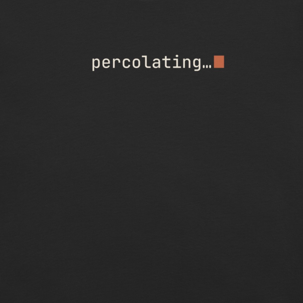 Vol. 02 percolating… tee, black, close-up of the monospace percolating… print and cursor block